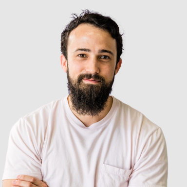 “Team section showcasing three professionals with profile photos, names, and roles including UI/UX designer, lead developer, and marketing & SEO specialist.”