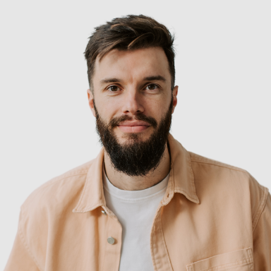 “Team section showcasing three professionals with profile photos, names, and roles including UI/UX designer, & SEO specialist.”